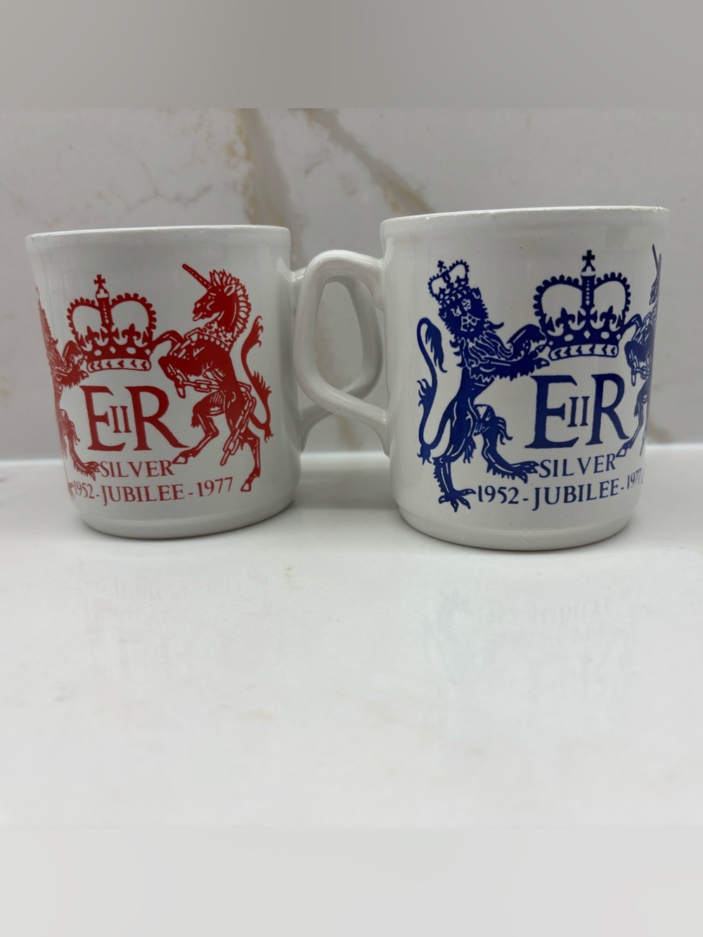 2 Vintage Queen Elizabeth II Silver Jubilee Mugs Royal Arms in Red and Blue 1977